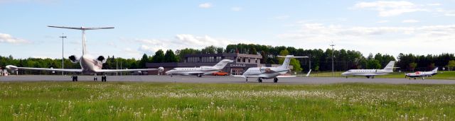 Cessna Citation X (N964QS) - A busy day on the ramp in Charlo, NB