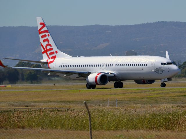 Boeing 737-800 (VH-YFK) - On taxi-way heading for take off on runway 05. Thursday 12th April 2012.