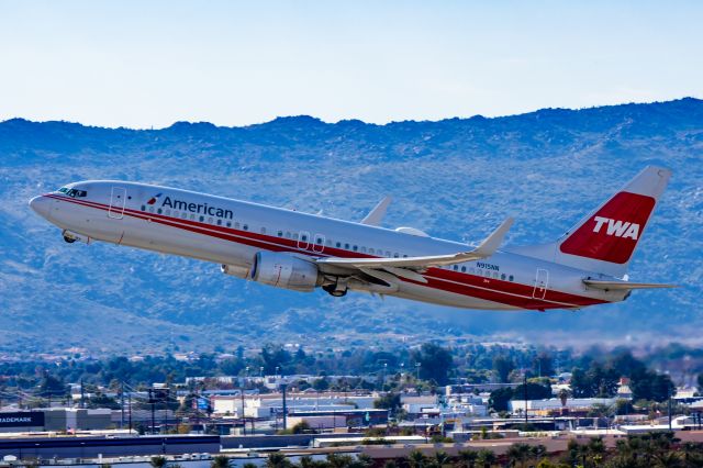 Boeing 737-800 (N915NN) - American Airlines 737-800 in TWA retro livery taking off from PHX on 12/16/22. Taken with a Canon R7 and Tamron 70-200 G2 lens.