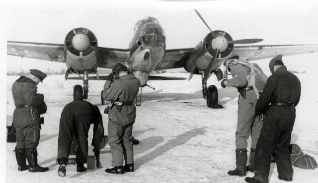 Grumman Goose (C-GYVG) - Ju 88 Russian Front 1942 - My dad getting his chute fitted before  Long Distance Reconnaissance Mission.  On a subsequent flight he was shot down deep inside Russia and kept as a prisoner of war for 7 years until 1949.