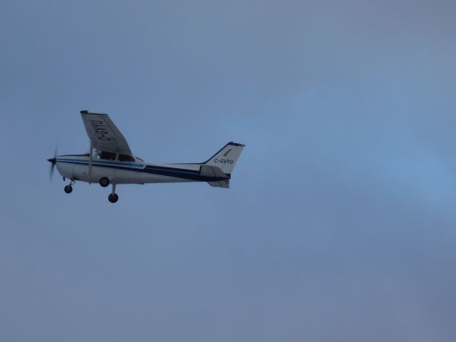 Cessna Skyhawk (C-GVYU) - flying over the active runway #25