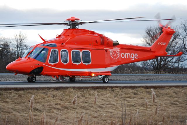 BELL-AGUSTA AB-139 (C-GYNP) - AgustaWestland 139. ORNGE, Air Ambulance landing on Highway 401 near Chatham Ontario, Canada. A woman was air lifted to a hospital in London Ontario.