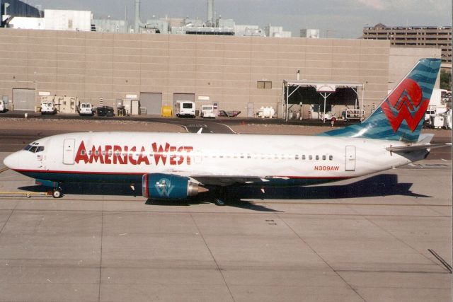 BOEING 737-300 (N309AW) - Seen here on 7-Aug-04.  Exported to Indonesia 15-Jun-15 where it became PK-YGV for Tri-MG Intra Asia Airlines.