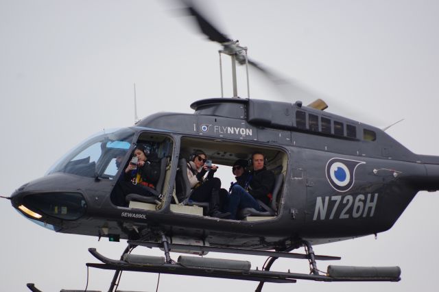 Bell JetRanger (N726H) - HHI HELIPORT-KEARNY, NEW JERSEY, USA-FEBRUARY 20, 2023: A sightseeing helicopter, operated by FlyNYON, is seen by RF at approximately 1109 hours preparing to land after a doors-off tour of New York City.