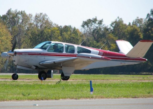 Beechcraft 35 Bonanza (N8571A) - 1949 Beech A35 at Downtown Shreveport.