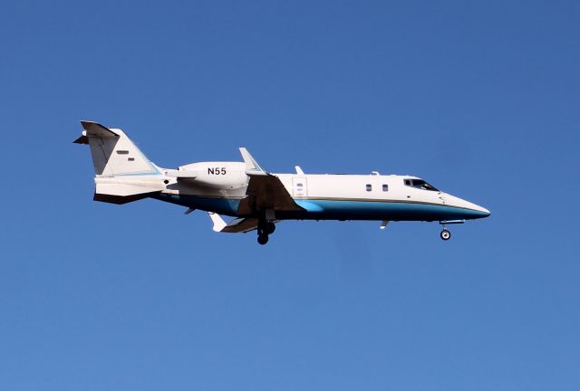 Learjet 60 (N55) - A Learjet 60 passing low and slow down the runway at Thomas J. Brumlik Field, Albertville Regional Airport, AL - February 15, 2017.