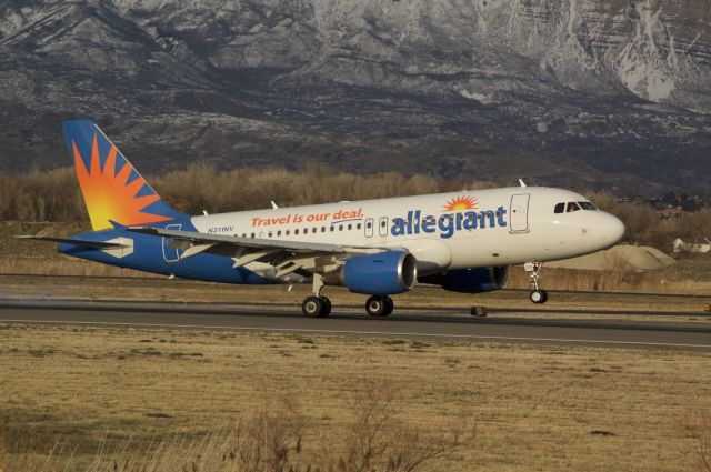 Airbus A319 (N311NV) - Touching down runway 13