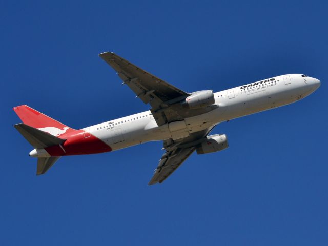 BOEING 767-300 (VH-ZXF) - Getting airborne off runway 23 on this beautiful Adelaide autumn day. Thursday 12th April 2012.