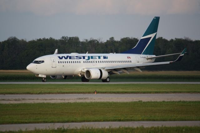 Boeing 737-700 (C-GLWS) - 005,is one of the first of the 737-700s delivered to Westjet,back in early 2000,i was working for Westjet as a ramp attendant and remember this plane when it first entered service,it is nice to see one of the original 700s arriving at London International Airport,CYXU. Photo taken August 12,2009