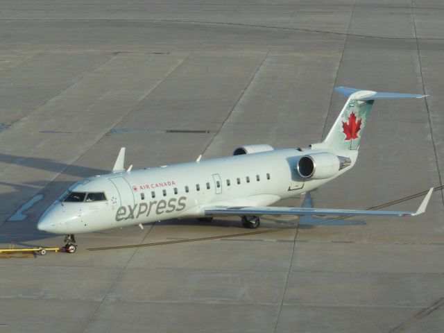 Canadair Regional Jet CRJ-200 (C-GTJA) - Air Canada Express (AC/ZX) C-GTJA CRJ-200 ER [cn7966]br /Milwaukee General Mitchell (MKE). Air Canada Express / Air Georgian regional flight pushes back for departure. br /Taken from airport car park roofbr /2016 05 26br /a rel=nofollow href=http://alphayankee.smugmug.com/Airlines-and-Airliners-Portfolio/Airlines/AmericasAirlines/Air-Canada-Express-AChttps://alphayankee.smugmug.com/Airlines-and-Airliners-Portfolio/Airlines/AmericasAirlines/Air-Canada-Express-AC/a