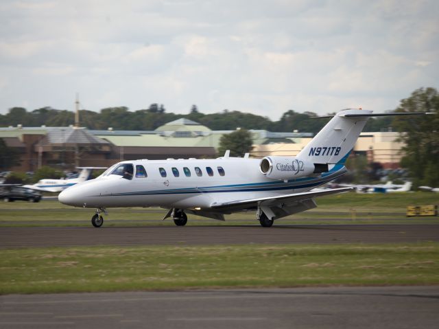 Cessna Citation CJ3 (N971TB) - Landing runway 26. Ground flaps deployed.