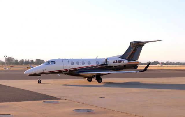 Embraer Phenom 300 (N348FX) - KRDD - Early on the ramp at Redding Jet Center July 16th, 2018