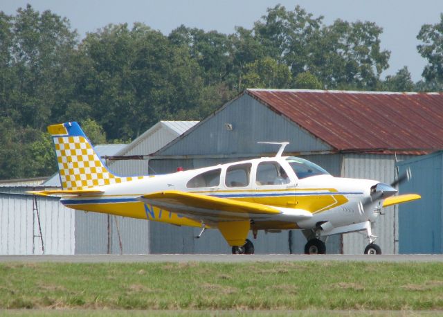 Beechcraft Bonanza (36) (N7732R) - Taking off from Downtown Shreveport.