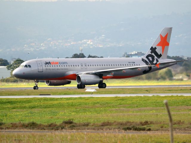 Airbus A320 (VH-VQW) - On taxi-way heading for Terminal 1, after landing on runway 23.  Wednesday 4th July 2012.