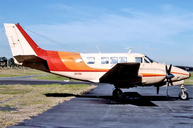 VH-TGA — - BEECHCRAFT 65-80 QUEEN AIR - REG - VH-TGA (CN LD-152) - KINGSFORD SMITH SYDNEY NSW. AUSTRALIA - YSSY 27/6/1988 35MM SLIDE CONVERSION USING A LIGHTBOX AND A NIKON L810 DIGITAL CAMERA IN THE MACRO MODE.