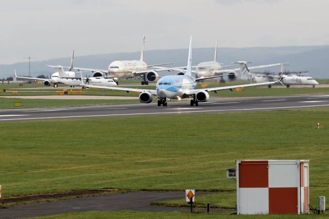 Boeing 737-800 (G-TAWC) - TOM2606 to Palma leads the 9am gaggle of departures.