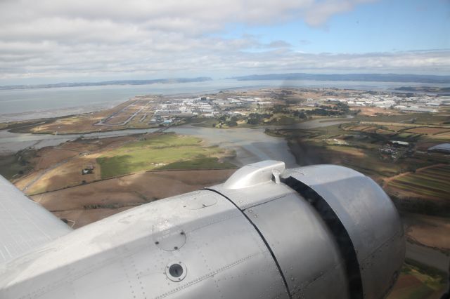 Douglas DC-3 (ZK-DAK) - On board FlyDC3.co.nzs Sunday Scenic Flight as we fly past Auckland International Airport