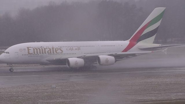 Airbus A380-800 (A6-EDY) - Departing on a snowy afternoon.