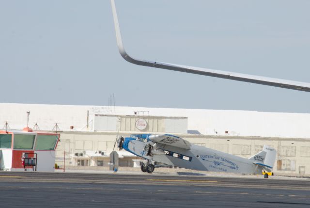 NC8407 — - 02/14/2015 Ford Tri Motor Old Tucson Hanger Background. 