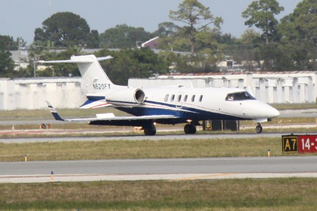 Learjet 40 (N620FX) - Learjet 40 (N620FX) taxis to hangar following arrival to Sarasota-Bradenton International Airport