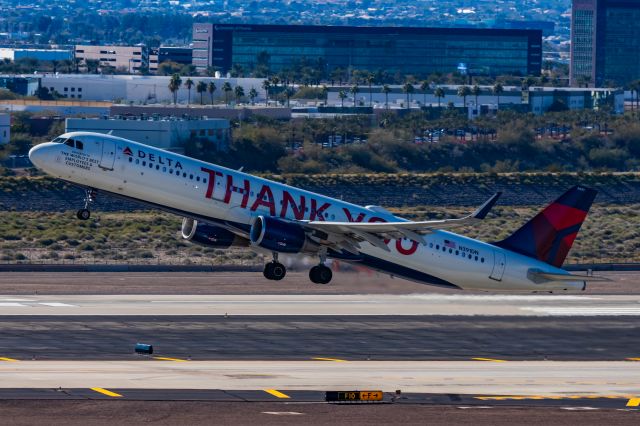 Airbus A321 (N391DN) - A Delta Airlines A321 in Thank You special livery taking off from PHX on 1/25/23. Taken with a Canon R7 and Tamron 70-200 G2 lens.