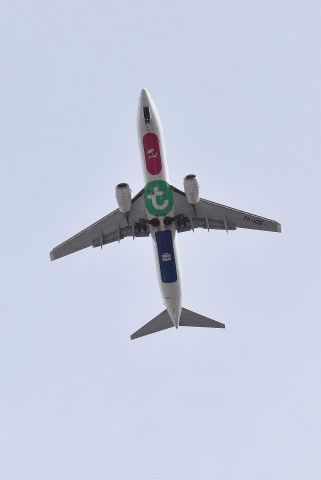 Boeing 737-700 (PH-HZE) - Transavia B737 PH-HZE overflying downtown Innsbruck, March 2016