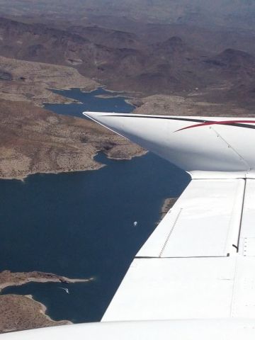 Cessna 310 (N7742Q) - Over lake pleasant AZ