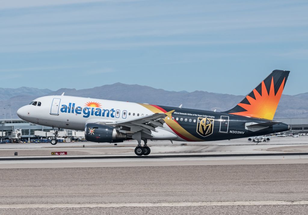 Airbus A319 (N302NV) - Allegiant Airlines A319-112 in new Vegas Golden Knights livery, arriving at McCarran Airport 9-22-19.