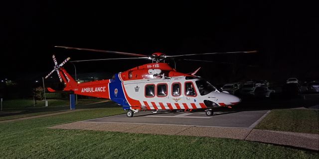 BELL-AGUSTA AB-139 (VH-YXG) - VH-YXG - HEMS1 - Albury Base Hospital Helipad, Albury NSW (26-04-19). Having already disembarked both the MICA flight paramedic and aircrew officer, the pilot returns to the hospital helipad, navigating a short two-minute flight back to YXAL after refuelling at Albury Airport (ABX/YMAY). The AW139 is certified to fly under single-pilot IFR.