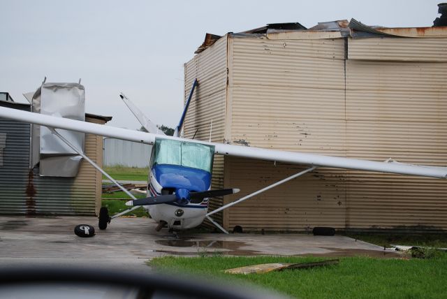 Cessna Skyhawk (N1219F) - Hurricane Ike. All that remained of the hanger is the slab. 100+ MPH winds removed the hanger then destroyed the airplane.