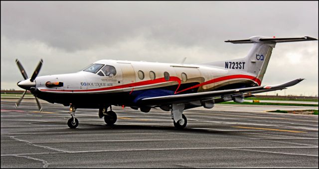 Pilatus PC-12 (N723ST) - Boutique flight 382 arrives at the Merced Regional Airport (sky added version)