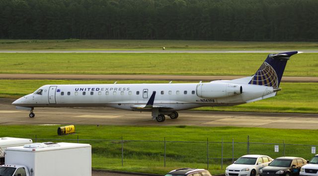 Embraer EMB-145XR (N14198) - Early morning departure of UCA Flight 4341 to Houston