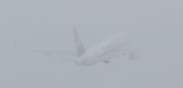 Boeing 757-200 (C-FGKJ) - Into the fog! takeoff runway 07. No edit!!