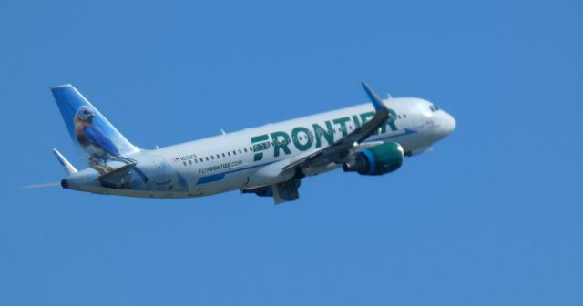 Airbus A320 (N230FR) - Shortly after departure is this 2015 Frontier Airlines Airbus 320-214 with "Betty" the Bluebird getting the tail view in the Summer of 2022.