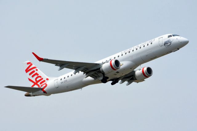 Embraer ERJ-190 (VH-ZPO) - Getting airborne off runway 23 and off to a Perth. Thursday 13th March 2014.