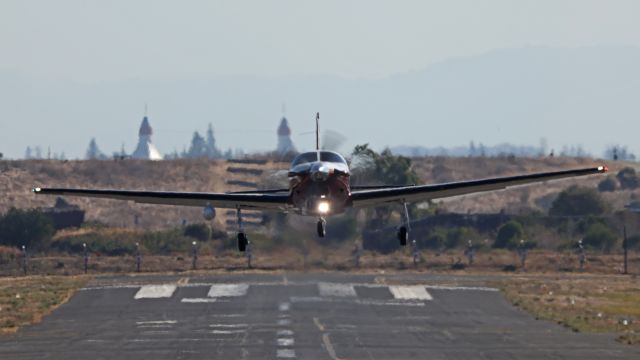 Piper Malibu Mirage (N4175K) - Taking off to the north from Palo Alto, California with Shoreline Amphitheatre in background.