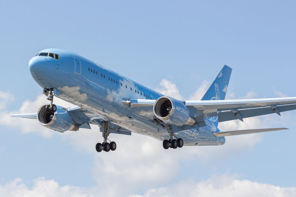BOEING 767-200 (N767CJ) - Drake gliding overhead.