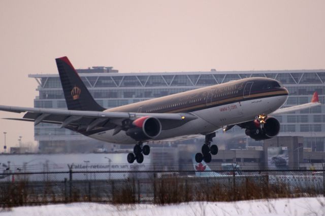 Airbus A330-200 (JY-AIF) - Arriving at Montreal, an intermediate stop, on the 2nd weekly flight from Detroit to Amman.