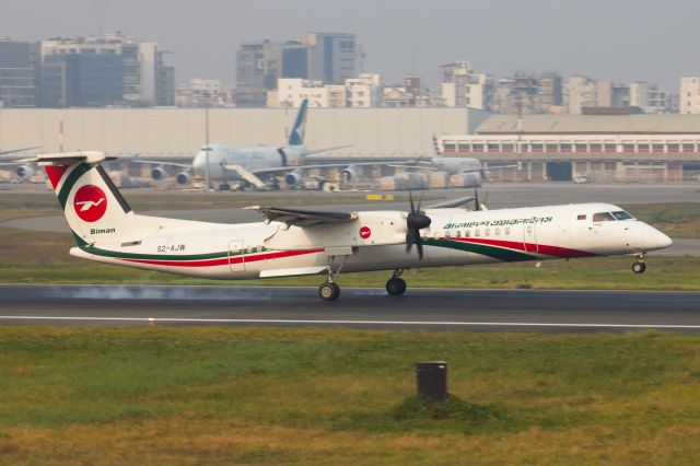 de Havilland Dash 8-400 (S2-AJW) - Alpha Juliet Whiskey performing a smokey landing