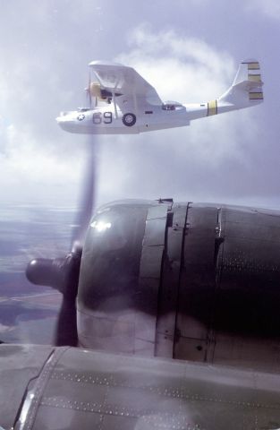 N7057C — - Photo taken from the Commemorative Air Force B-17 "Texas Raiders" of this PBY during formation flying over south Texas.