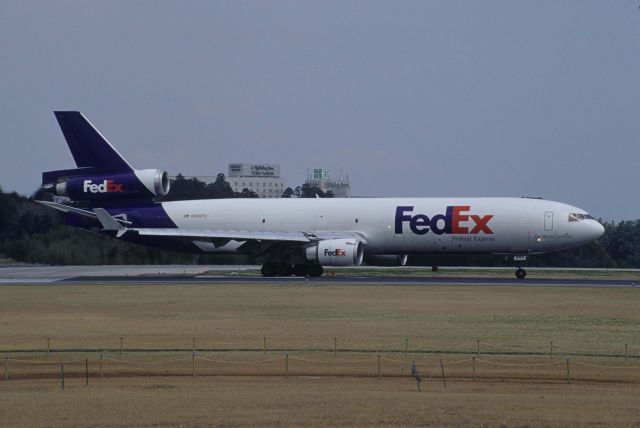 Boeing MD-11 (N585FE) - Departure at Narita Intl Airport Rwy16R on 1999/04/01