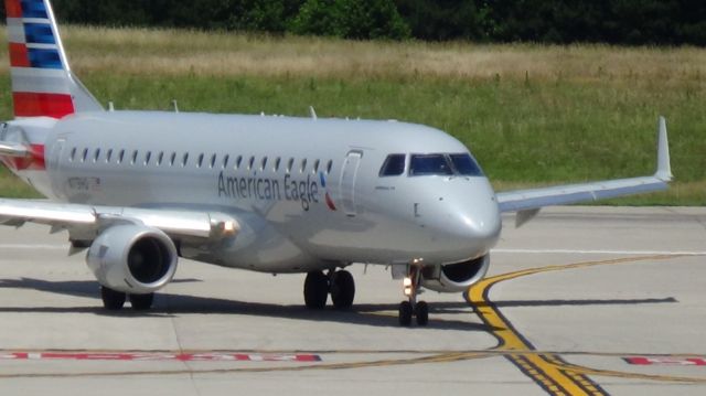 Embraer ERJ 175 (N119HQ) - American Eagle  (Republic) 3459 arriving from Philadelphia at 12:29 P.M.   Taken June 7, 2015.  