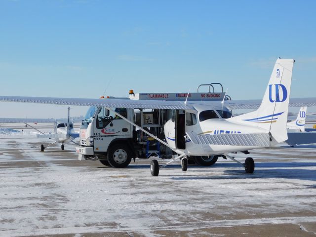 Cessna Skyhawk (N57UD) - A clear January day meant a busy day of flying for University of Dubuque Aviation Students.  In this case, a near empty ramp was a good thing!!!  N57UD gets refueled before departing for another flight.