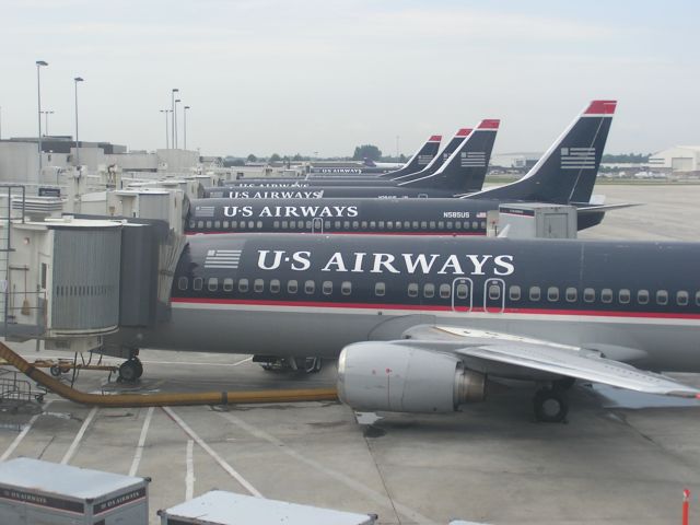 BOEING 737-400 (N441US) - Line up of US 737s on C Con in CLT back in June 2004 !