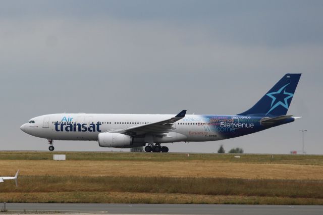 Airbus A330-200 (C-GTSR) - Air Transat (TS) C-GTSR A330-243 [cn966]br /Paris Charles de Gaulle (CDG). Air Transat flight TS389 to Toronto Pearson (YYZ) races down the runway for take-off. br /Taken from Terminal 1 arrivals level.br /2018 08 09br /a rel=nofollow href=http://alphayankee.smugmug.com/Airlines-and-Airliners-Portfolio/Airlines/AmericasAirlines/Air-Transat-TS/https://alphayankee.smugmug.com/Airlines-and-Airliners-Portfolio/Airlines/AmericasAirlines/Air-Transat-TS//a