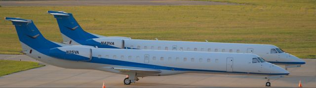 Embraer ERJ-145 (N25VA) - Parked at Signature Flight Services Sat morning 7-10-21