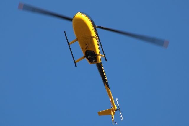 Robinson R-44 (N608HR) - 2014 Robinson R44 Raven II flying over the PDK playground. Photo taken on 10/1/2020.