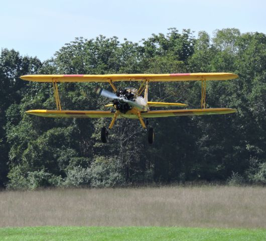 N1626M — - This 1943 Bi Plane is ready to land on the grassy runway, summer 2018.