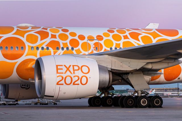 BOEING 777-300ER (A6-ENM) - Tutti Frutti. The pink and orange hues in this photo makes me hungry for some candy!