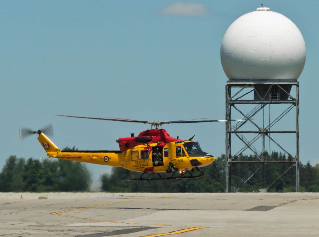 Bell 412 (14-6432) - Arriving on a hot tarmac.